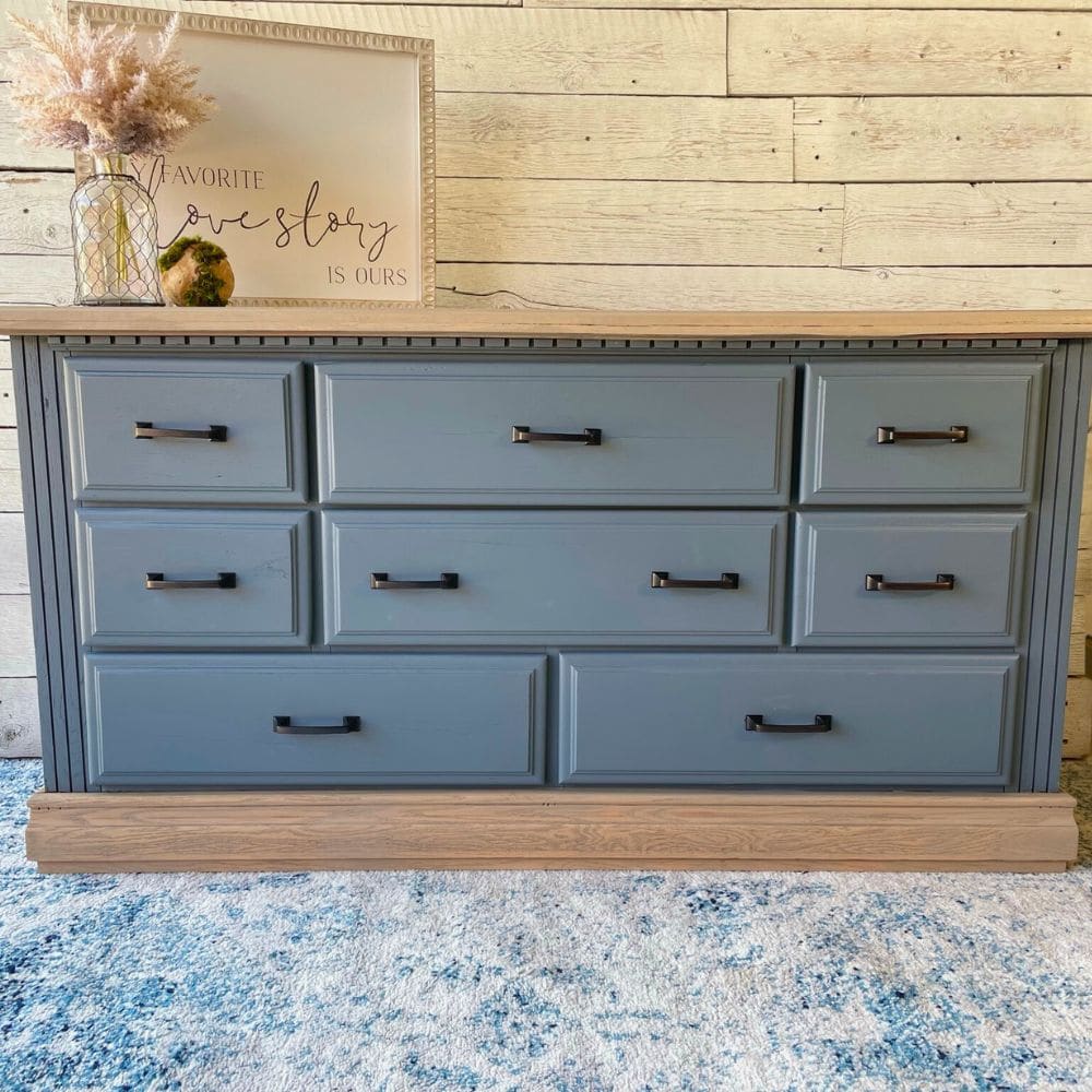 blue gray dresser with weathered oak wood on top and bottom