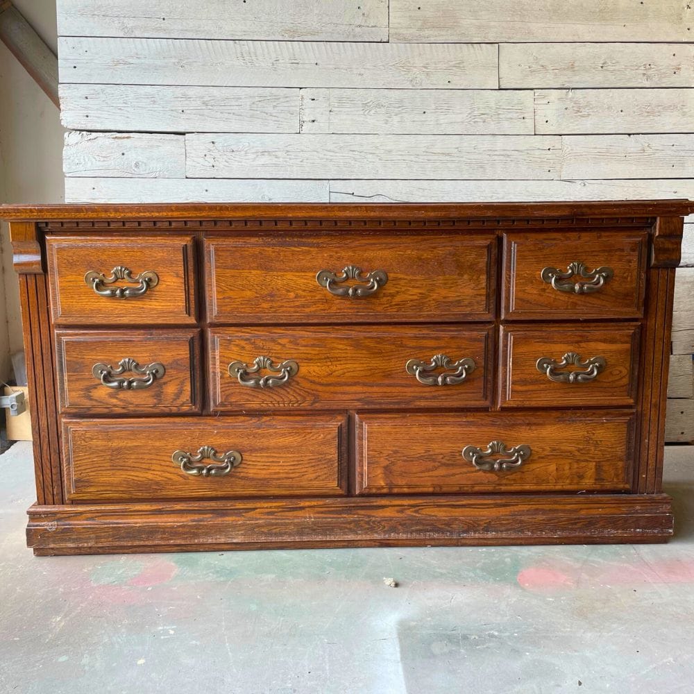 8 drawer wooden dresser with vintage bulky drawer pulls