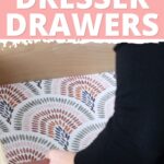 Person lining a dresser drawer with patterned paper, text reads Best Material to Line Dresser Drawers.