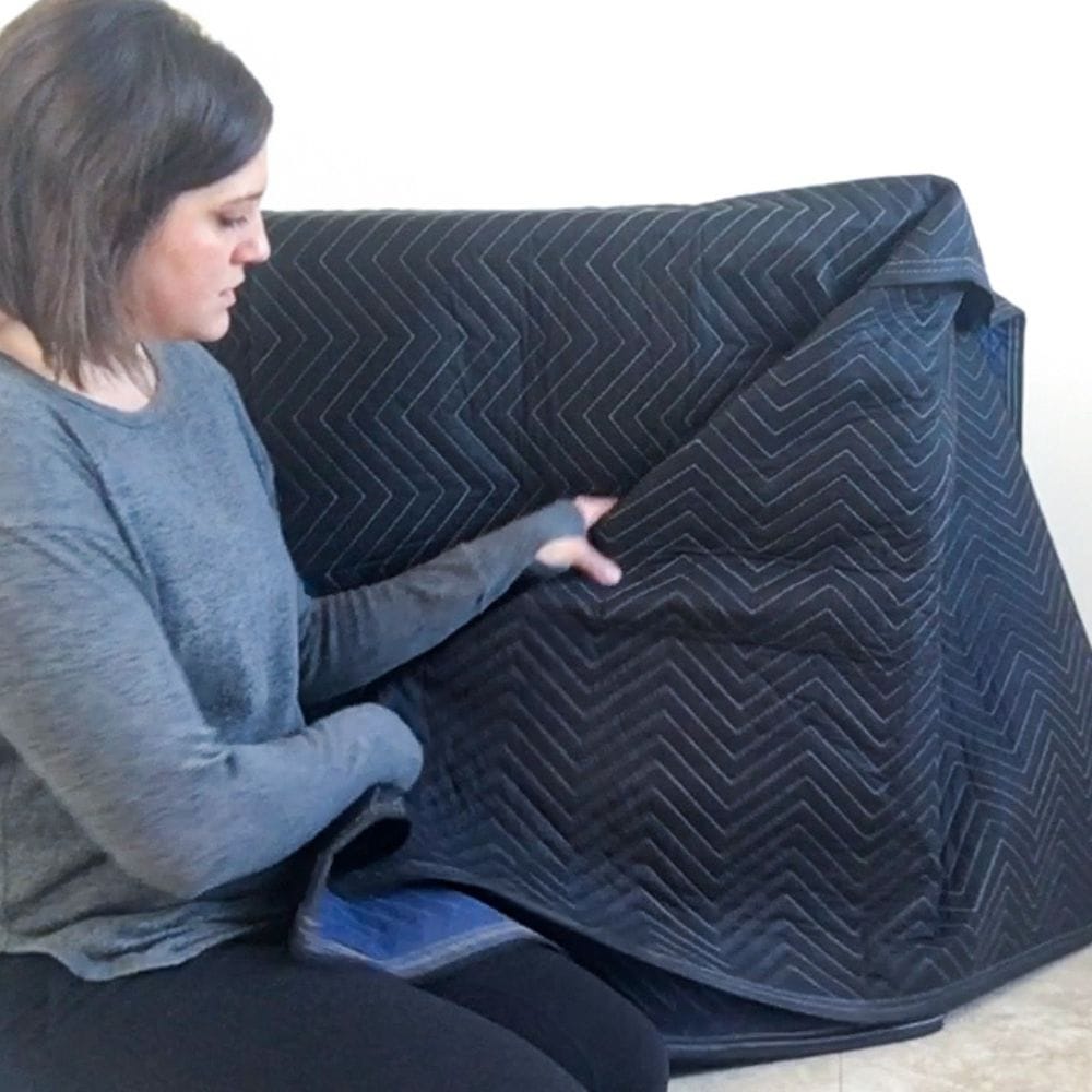 using moving blankets to protect larger furniture during shipping