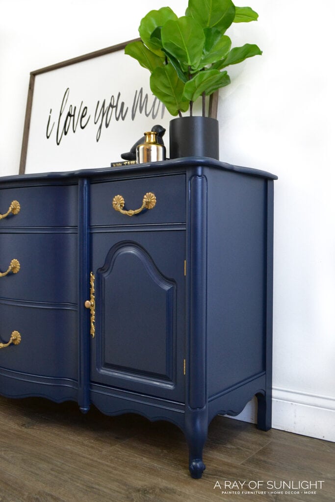 side view of navy blue painted buffet with chalk paint
