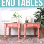 Two coral chalk-painted end tables with white knobs