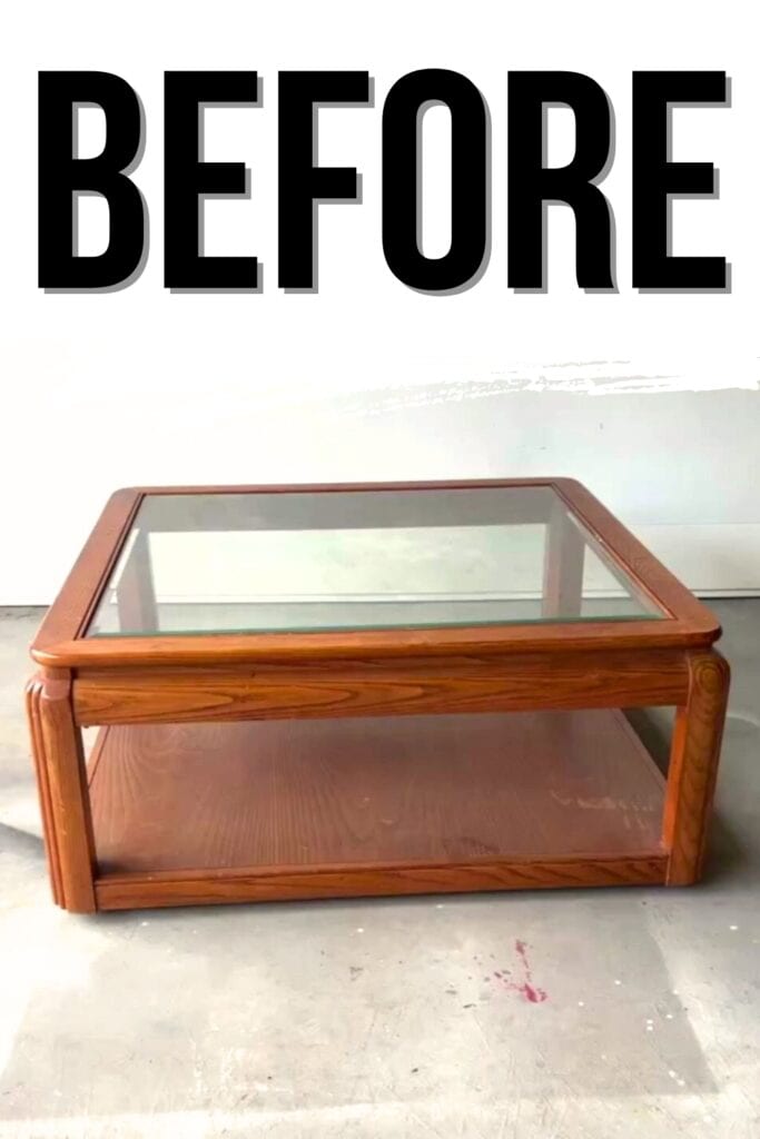 large square coffee table with gloass top and orange wood finish