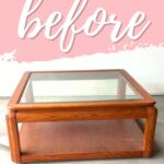 Wooden and glass coffee table with before written above in white script on a pink background.
