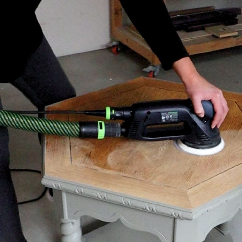 Festool Rotex 125  with a port connected to a vaccum