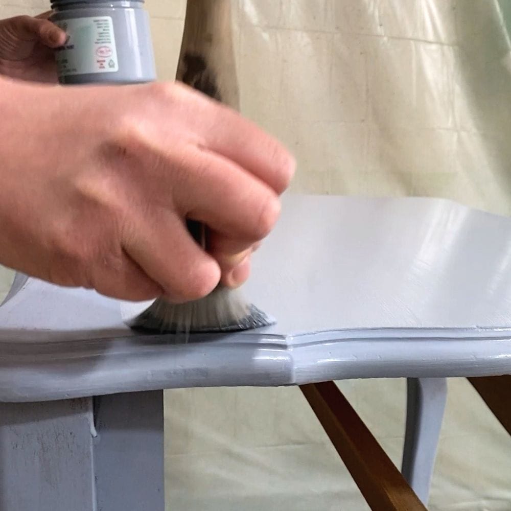 applying  Dixie Belle Silk All-In-One Mineral Paint with a high quality paint brush