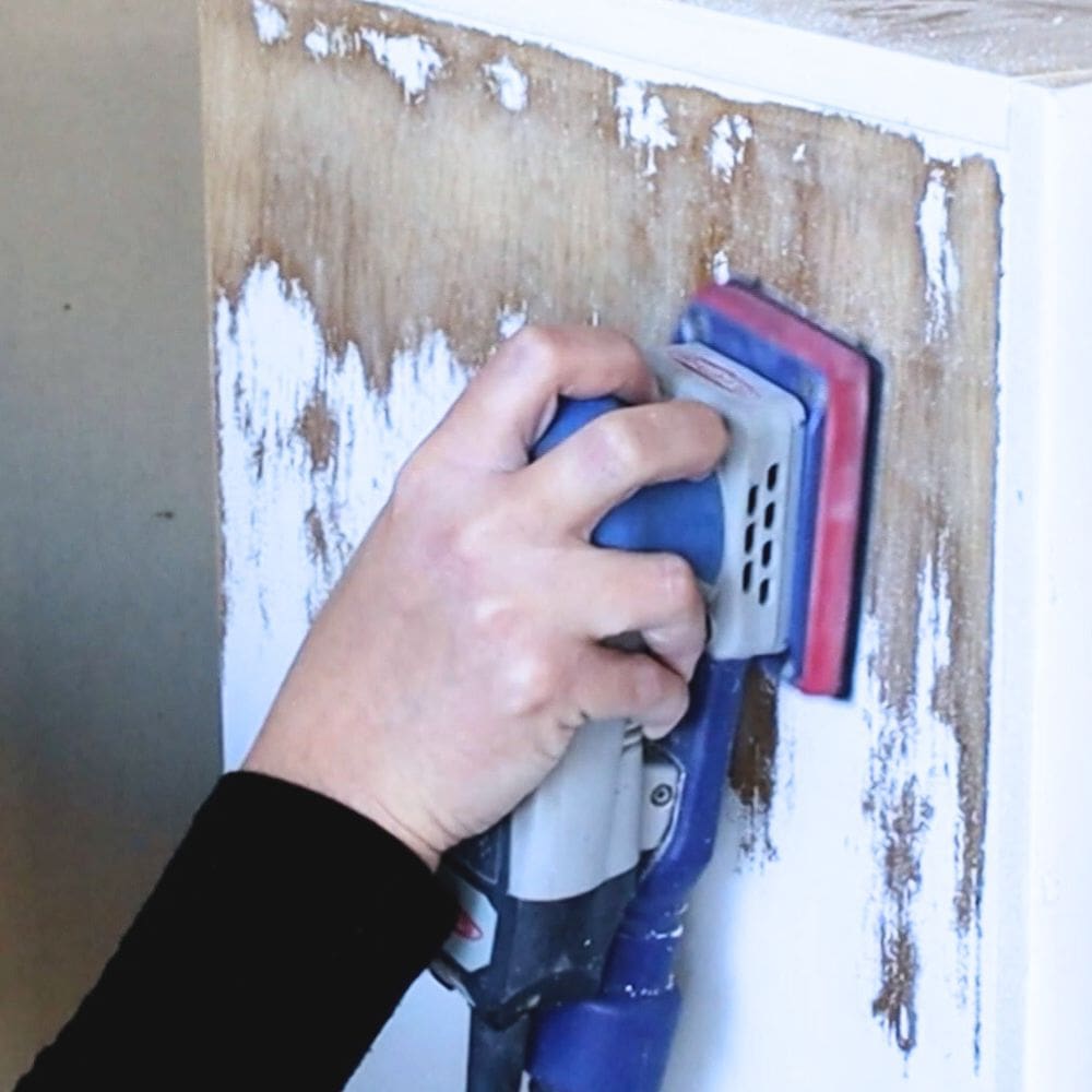photo of SurfPrep 3x4 Sander removing paint from furniture