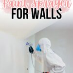 Person in protective suit spray painting a white wall; text reads Best Paint Sprayer for Walls.