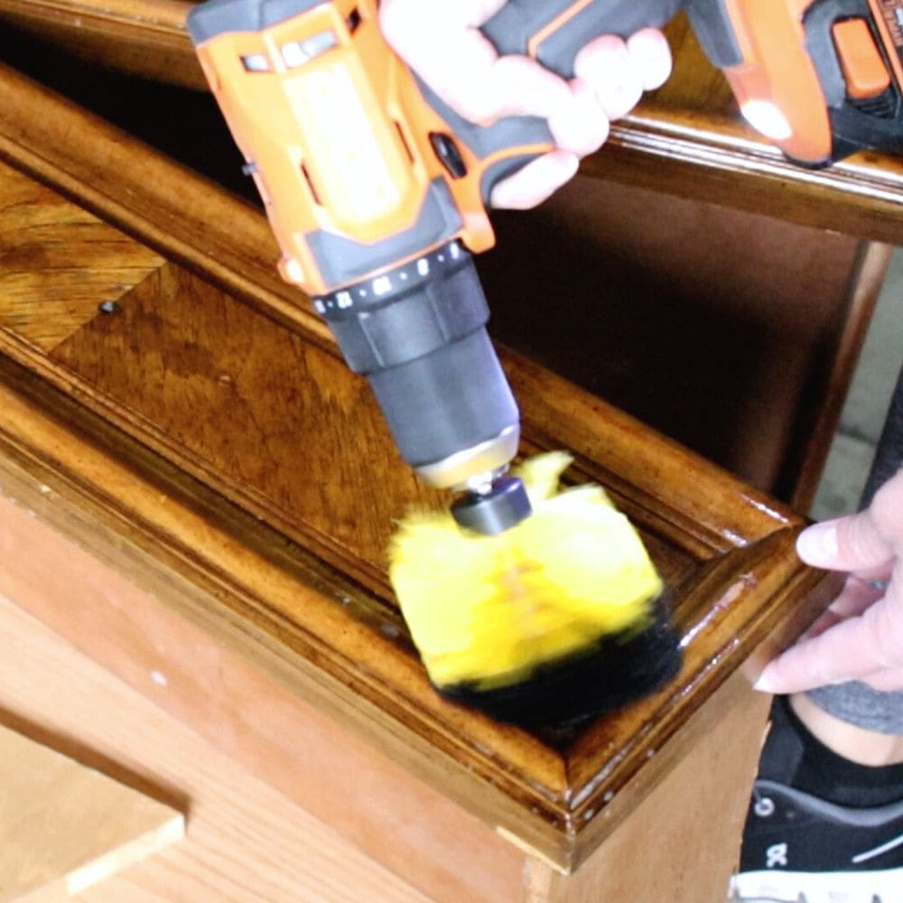 cleaning drawers with electric drill with brush attachment