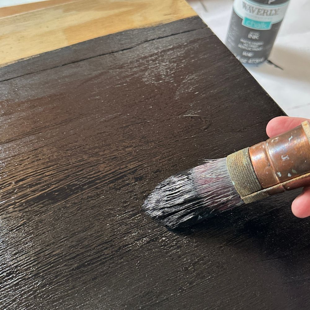 painting the plywood with waverly chalk paint using a zibra brush