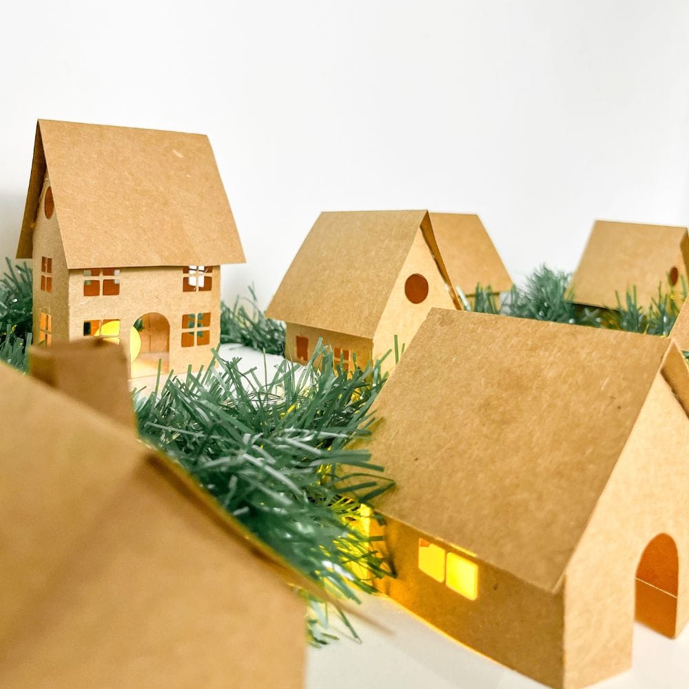 Christmas village houses with added greenery