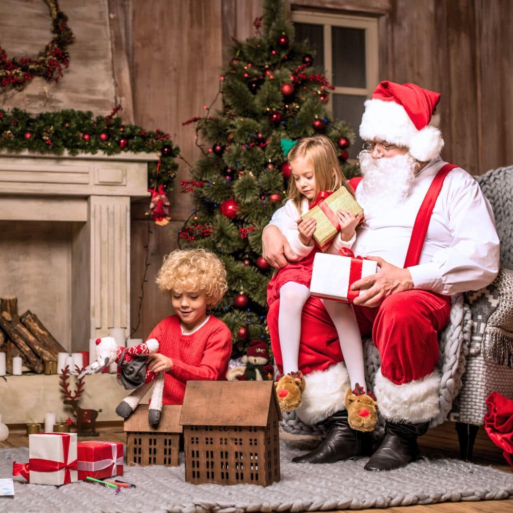 picture of Santa with kids opening presents