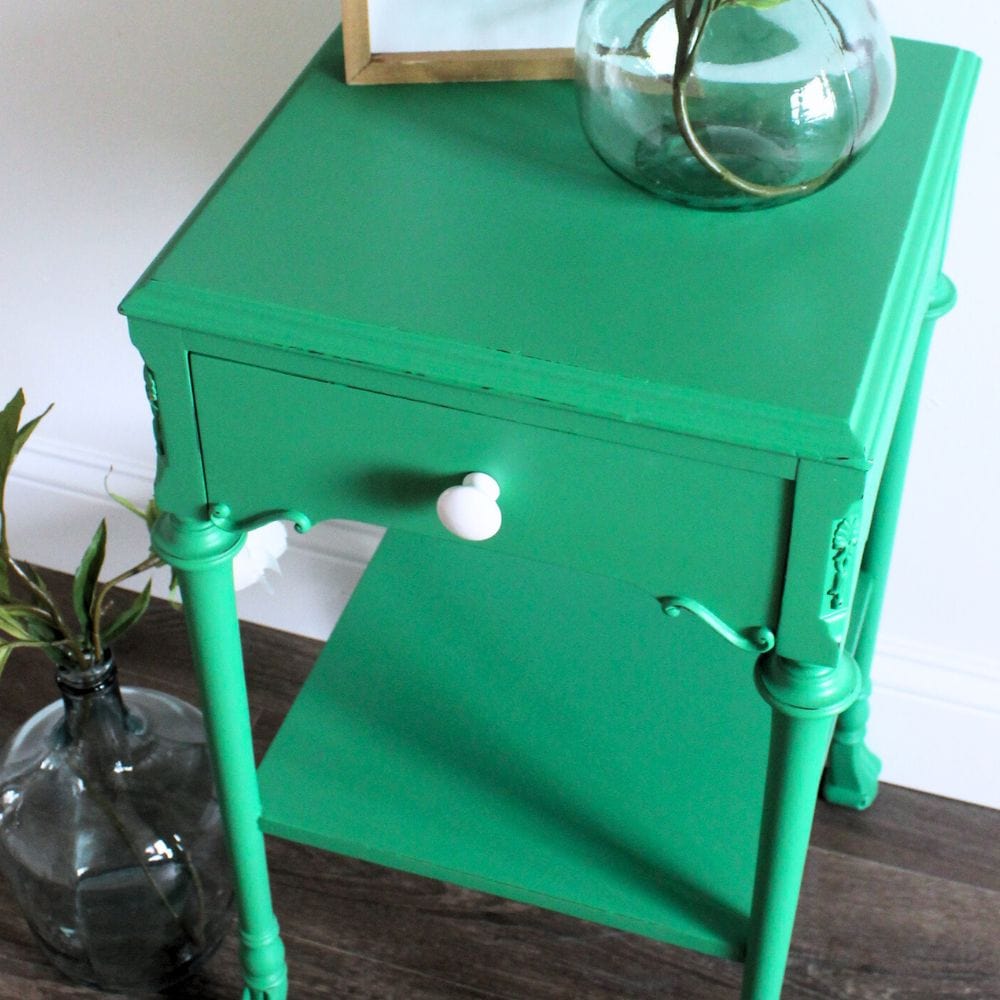 close-up of emerald green bedside table after the makeover