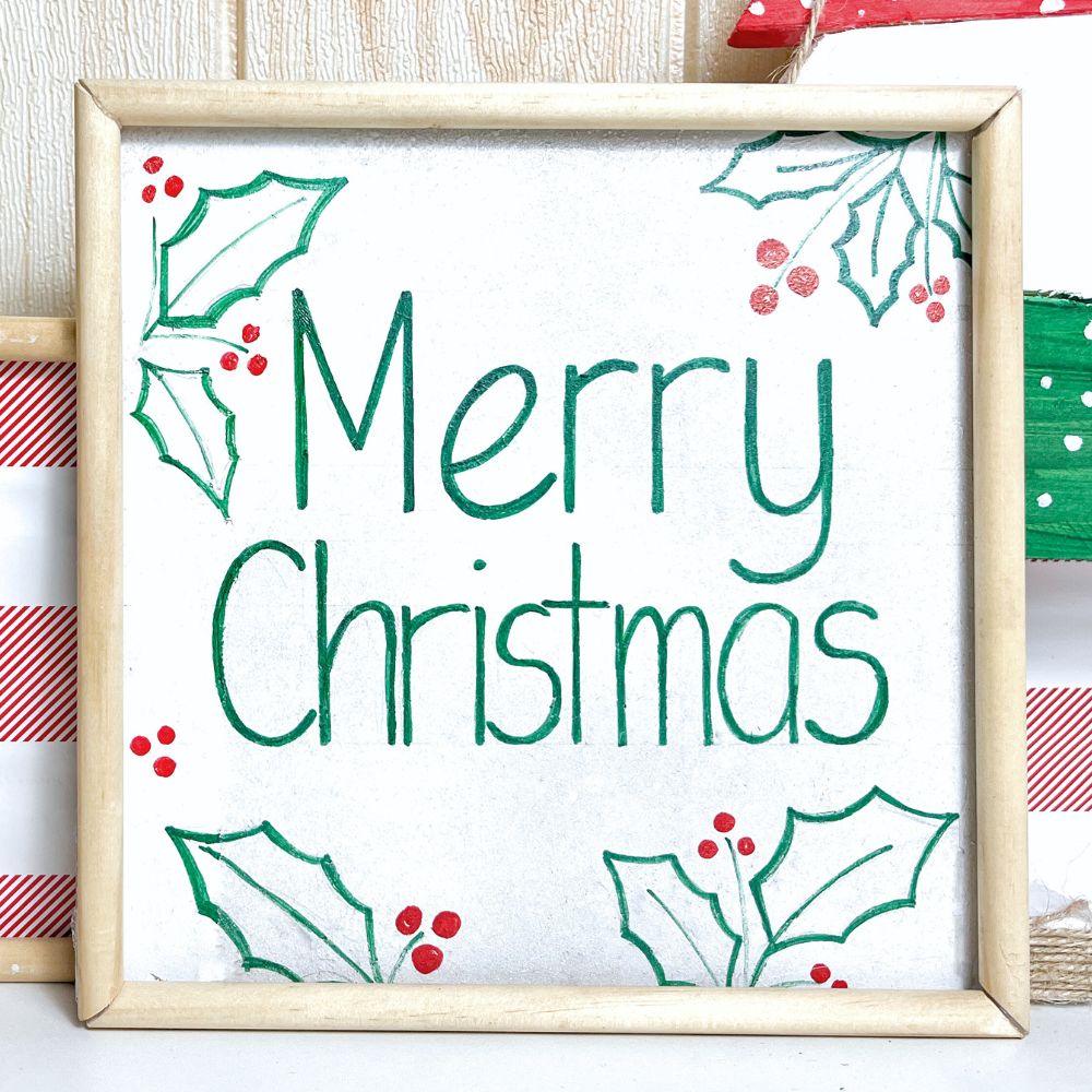 close-up view of small merry Christmas sign