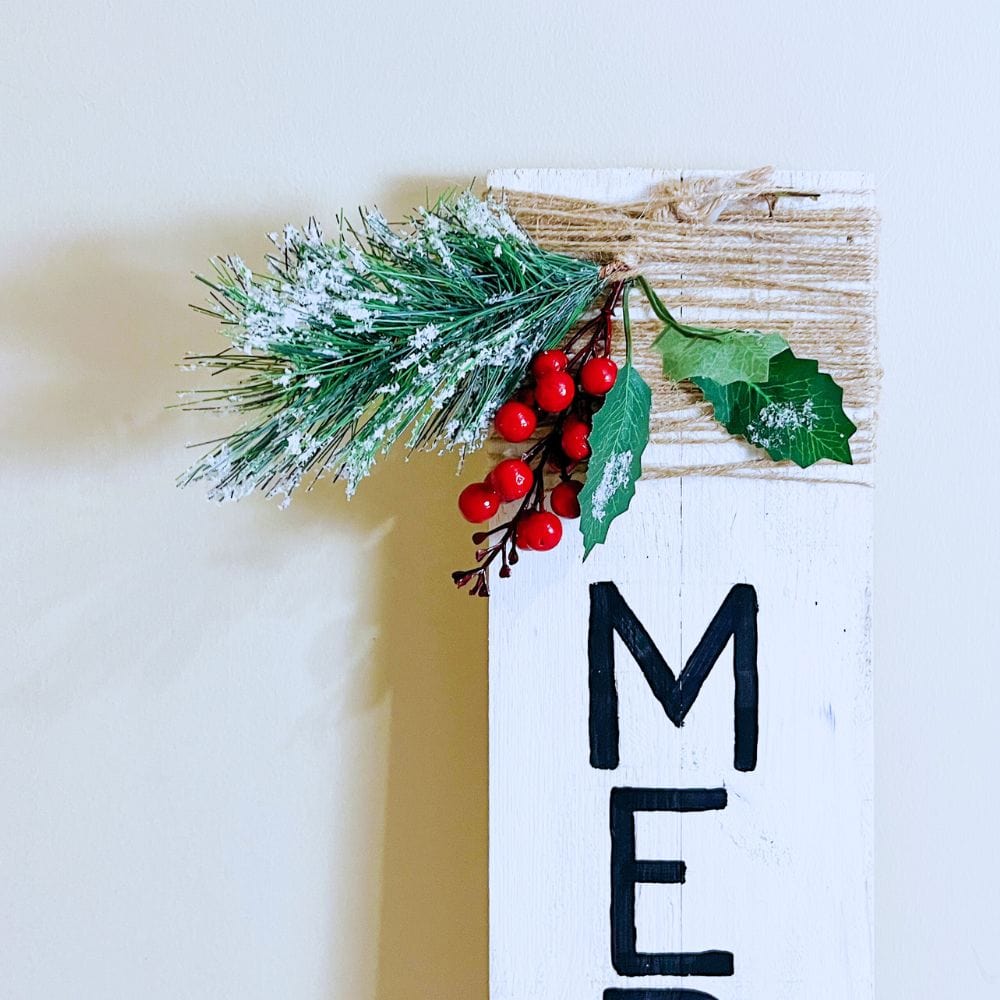 close-up view photo of merry Christmas standing sign