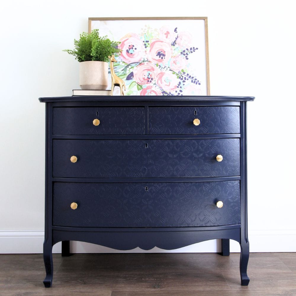 full view photo of navy blue chest of drawers after the makeover