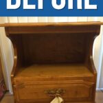 A wooden nightstand with one drawer and an open shelf