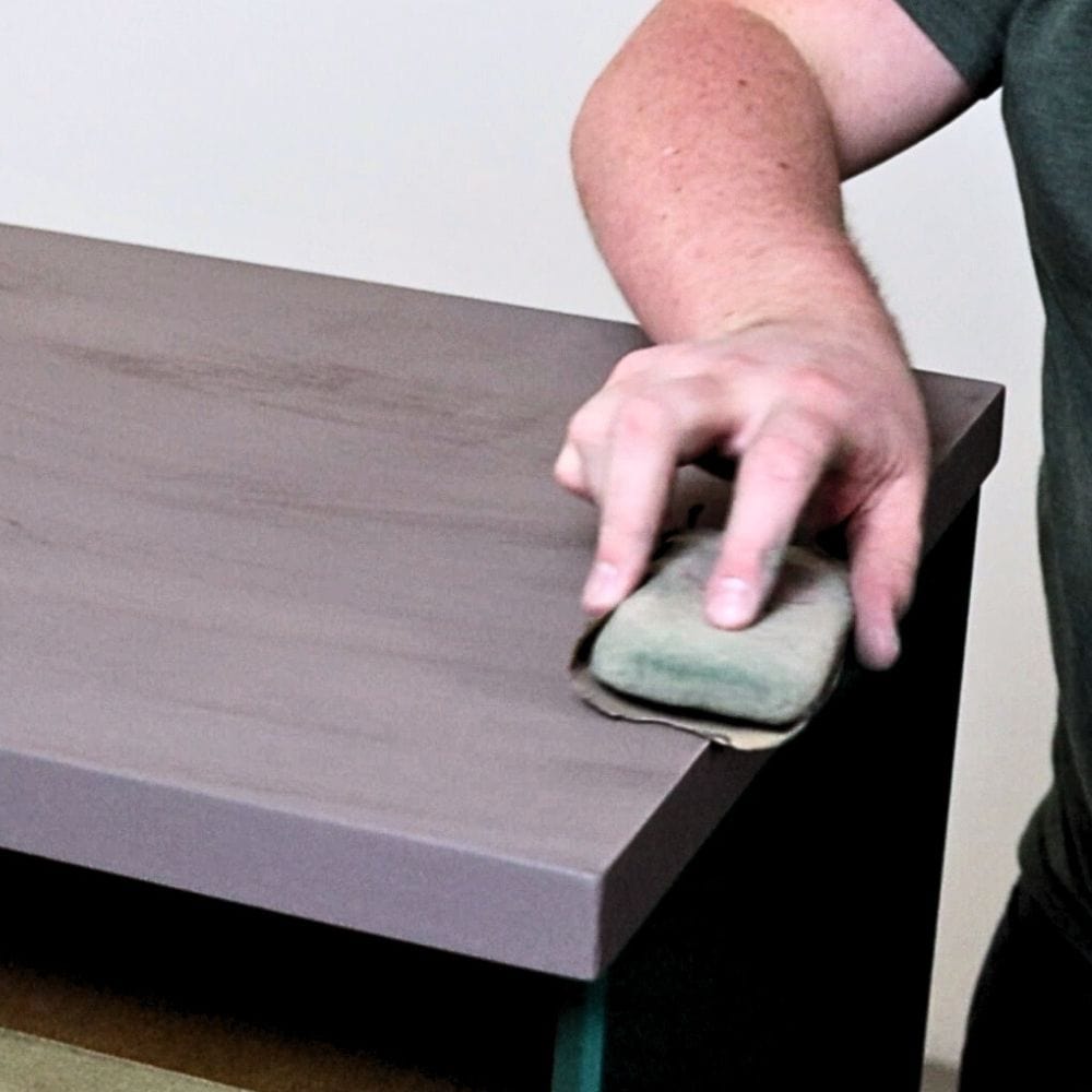 Photo of sanding furniture by hand