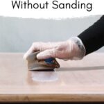 applying polyurethane over a stained wood top with a sponge