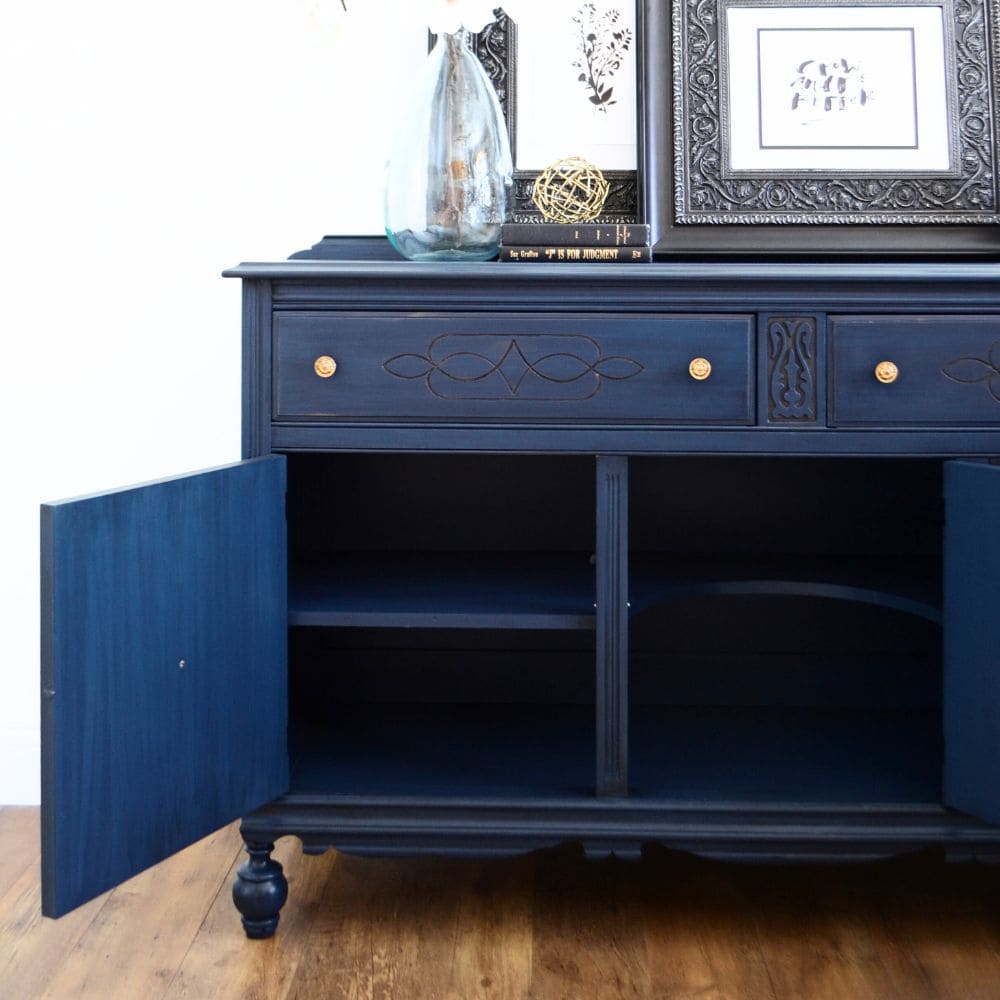 close-up photo of Antique Sideboard Buffet with open doors after the makeover