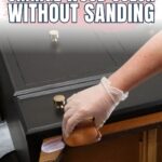 Gloved hand applying stain to a drawer; text reads How to Change Wood Color Without Sanding.
