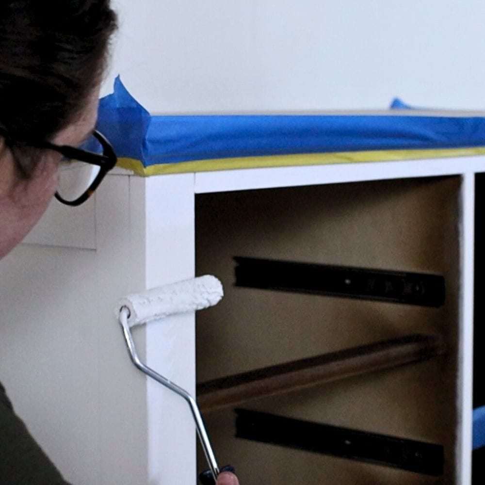 photo of painting furniture using a paint roller