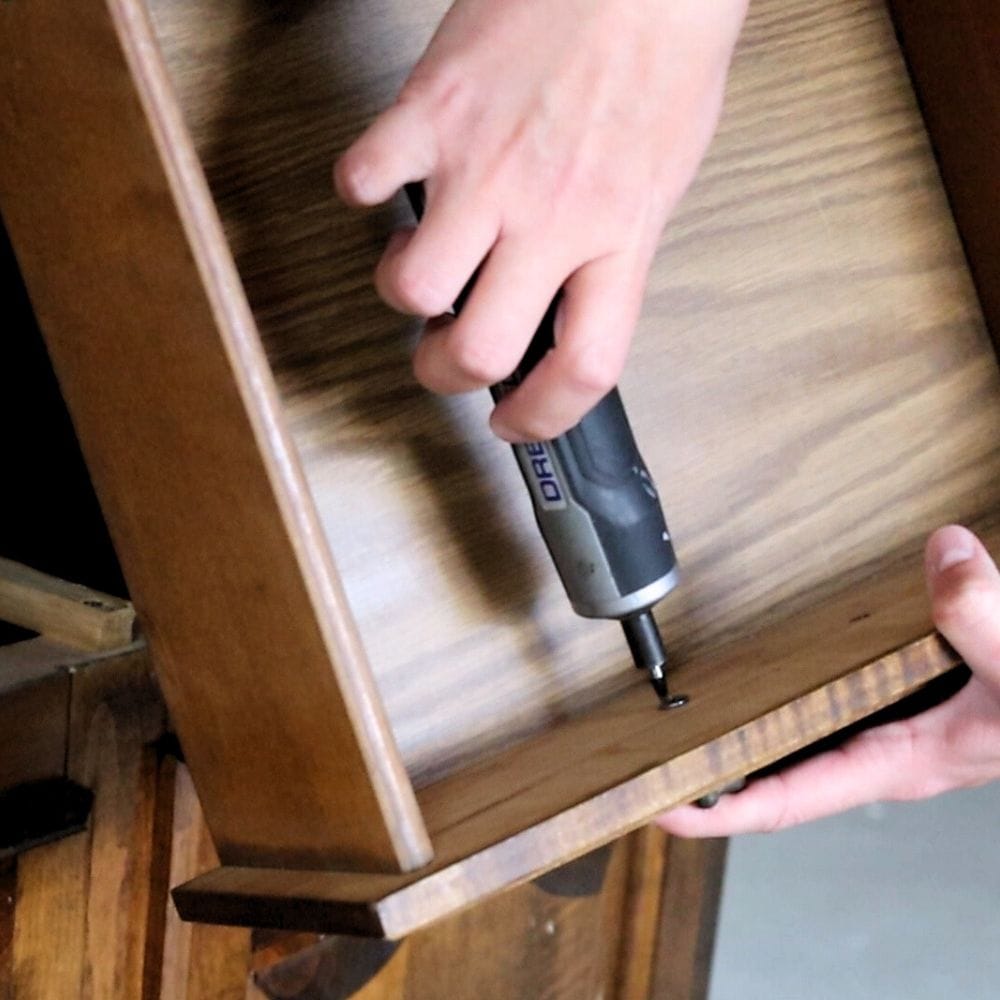 photo of removing hardware from furniture