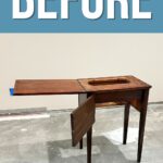 Old wooden sewing table with an open panel, set against a plain wall, labeled BEFORE at the top.