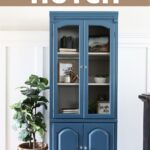 blue painted hutch with crystal knobs