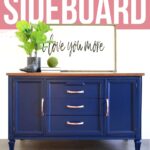 Blue sideboard with gold handles and stained wood top