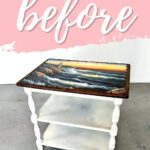 Small white table with painted seascape on top, labeled “before” on a pink and white background.