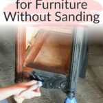 A person applies black paint to a wooden furniture piece with text: Best black paint for furniture without sanding.