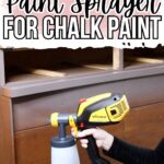 Hand holding a yellow paint sprayer, aimed at a wooden dresser; text reads Best Paint Sprayer for Chalk Paint.