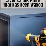 A person uses a paint sprayer on a blue cabinet with text about painting over waxed chalk paint.