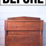 A wooden dresser with four drawers, labeled BEFORE at the top, against a white shiplap wall.