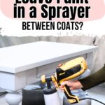 Person holding a yellow paint sprayer near a white table with text: Can I leave paint in a sprayer between coats?.