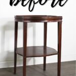 A small, dark wood side table with curved edges, labeled before in black script.