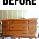 A wooden dresser with brass handles, labeled BEFORE, stands on paint cans in a room.