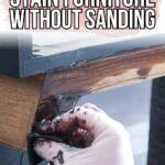 A gloved hand stains wooden furniture without sanding, with text How to stain furniture without sanding.