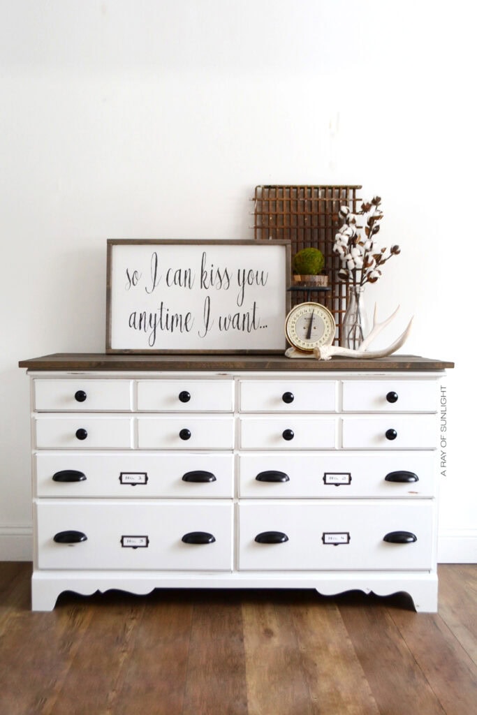 white dresser with stained top