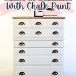 White chest of drawers with dark handles, styled with books on top; text reads PAINTING A CHEST OF DRAWERS With Chalk Paint.