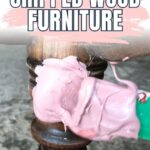 A hand applies pink wood filler to a chipped wooden furniture leg; text reads How to Repair Chipped Wood Furniture.