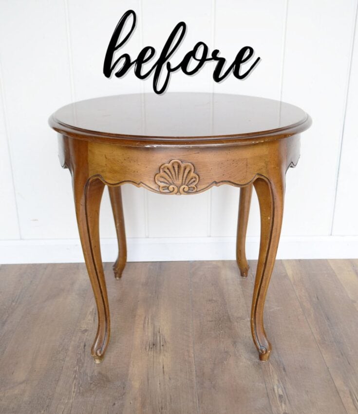 round wooden piece of furniture against a white wall