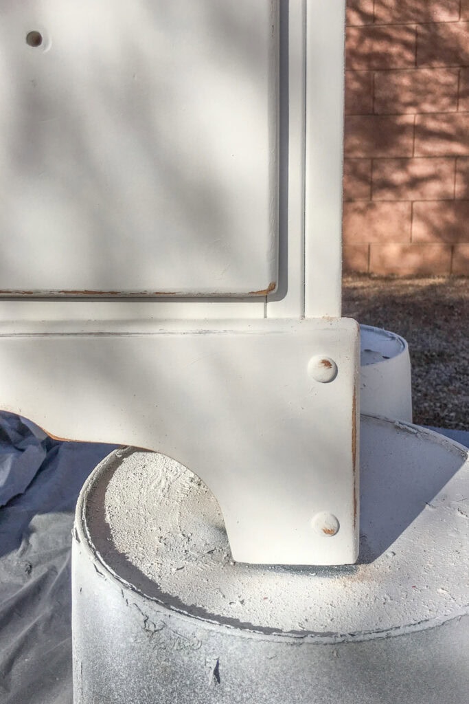 Close-up of distressed painted wooden furniture
