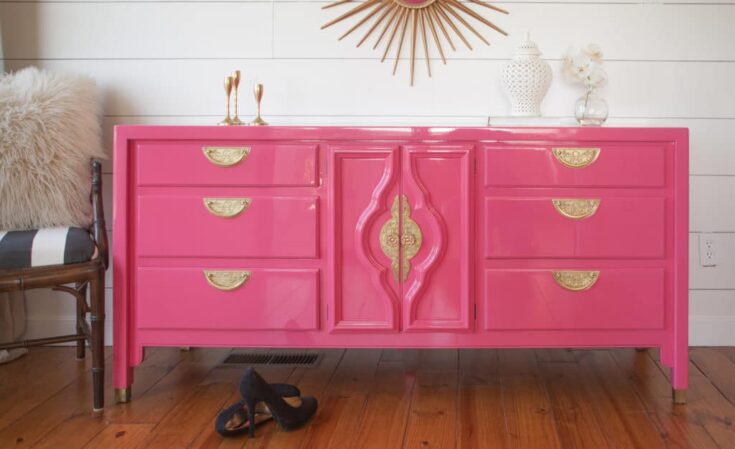 Bright pink dresser with gold handles