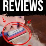 Close-up of a hand using a Surfprep sander on wood, with red arrows and Reviews text above.