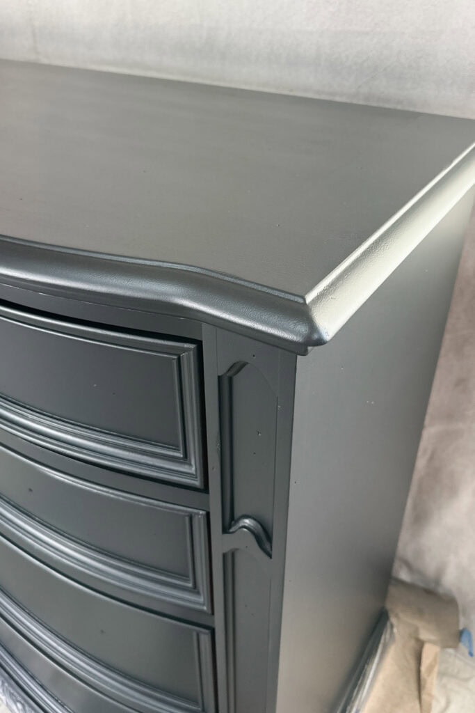 Closeup of smooth black finish on furniture