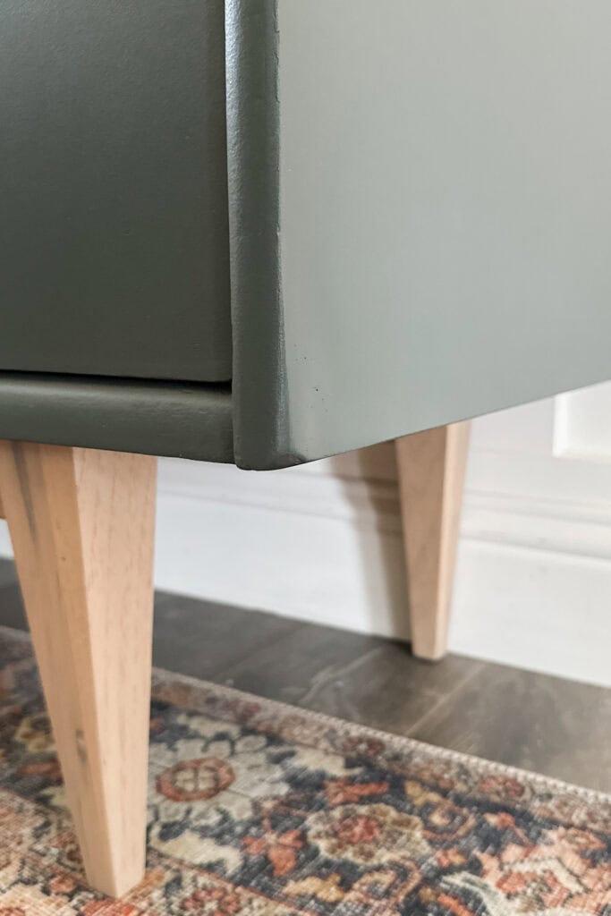 Closeup of a green dresser corner