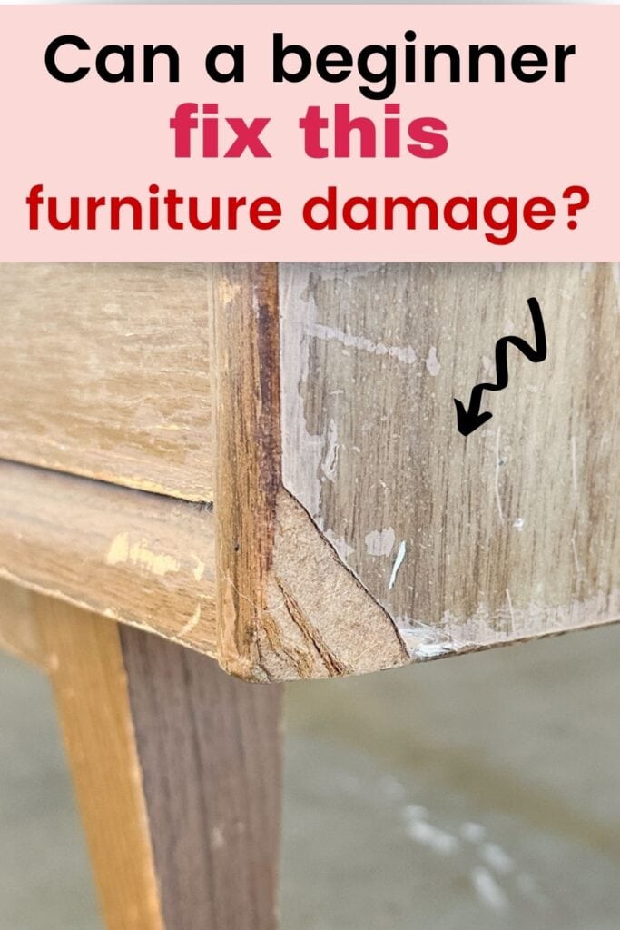 Damaged wooden furniture corner with chipped veneer