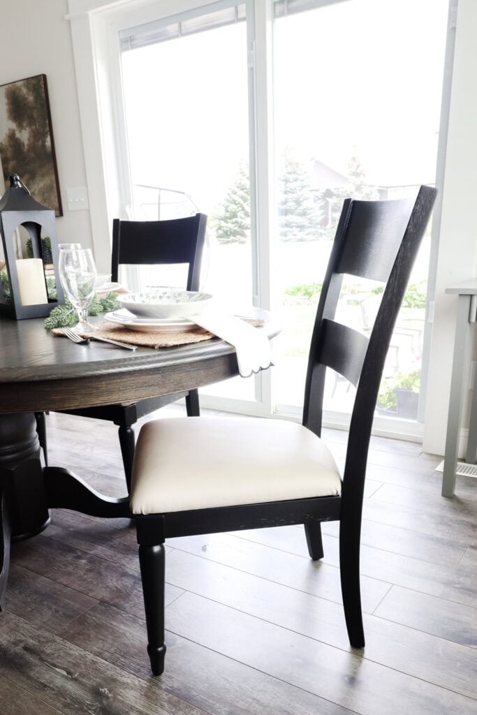 Black chairs by a dining table
